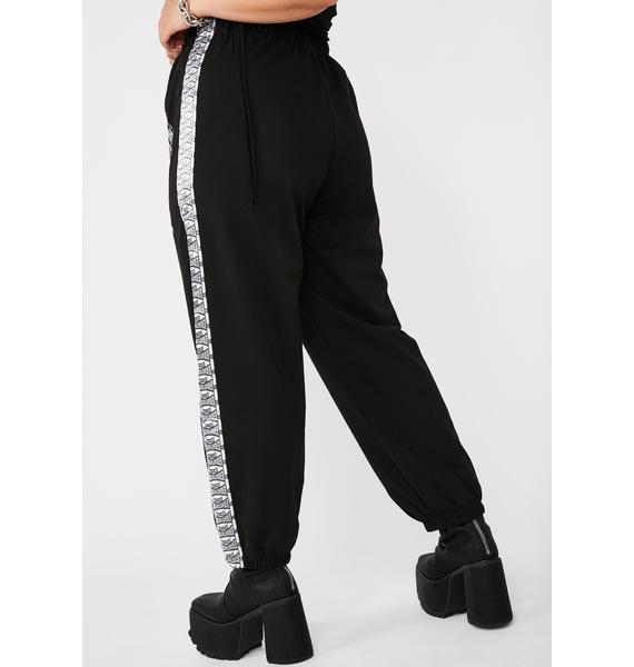 womens nike tape joggers