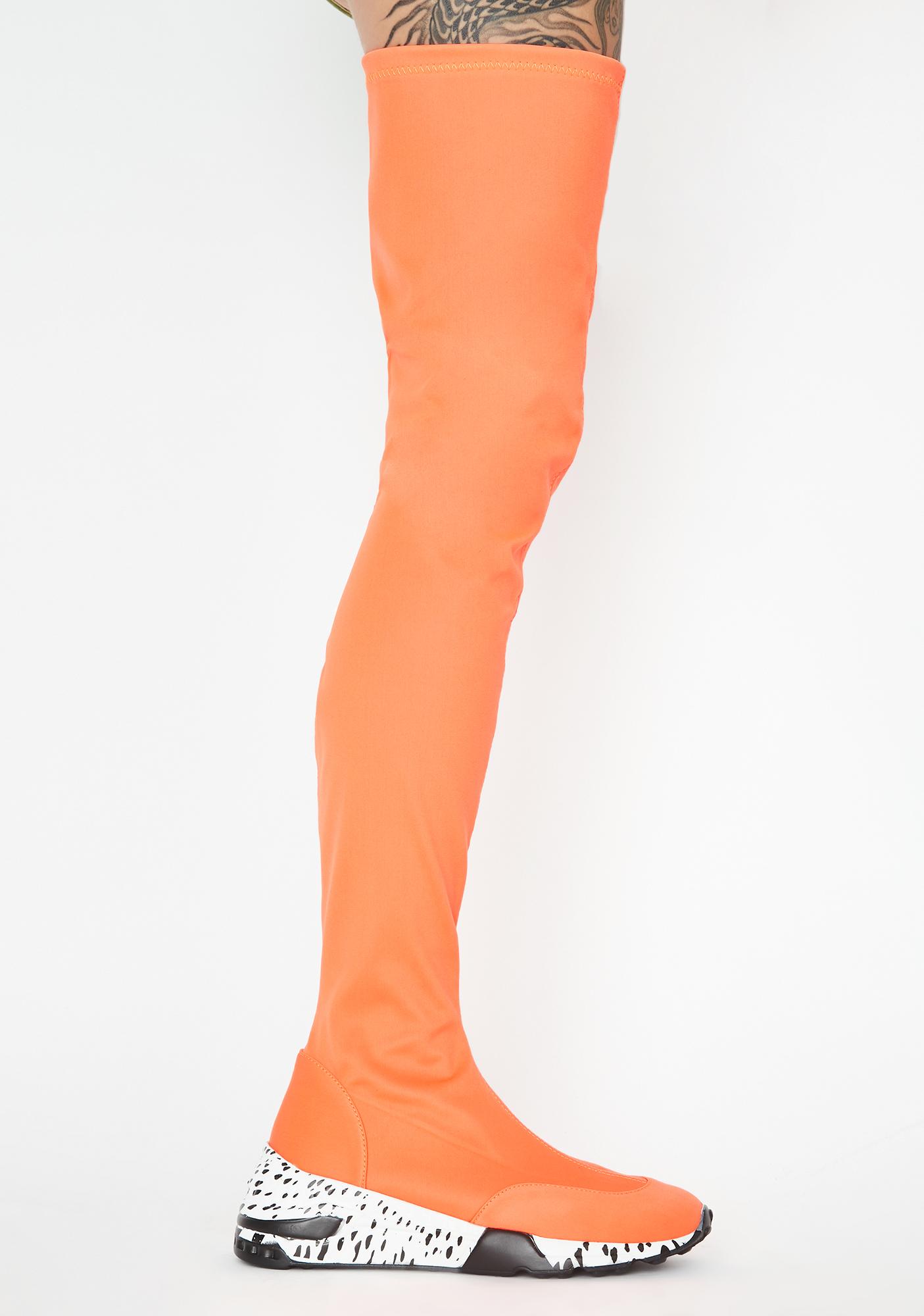 orange thigh high boots