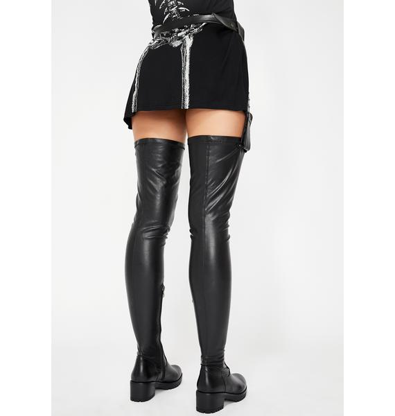 black belted thigh high boots