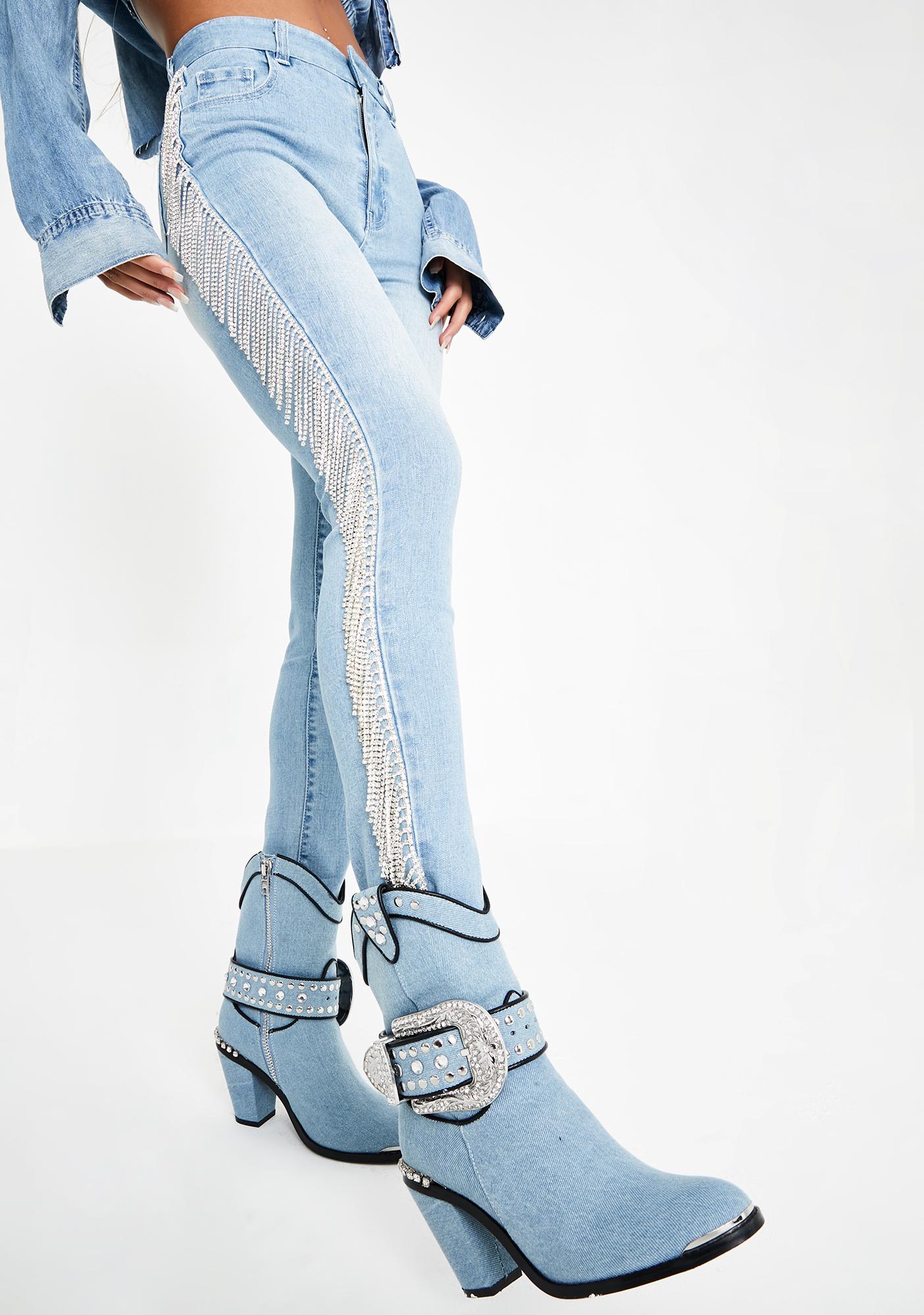blue jeans with fringe on the side
