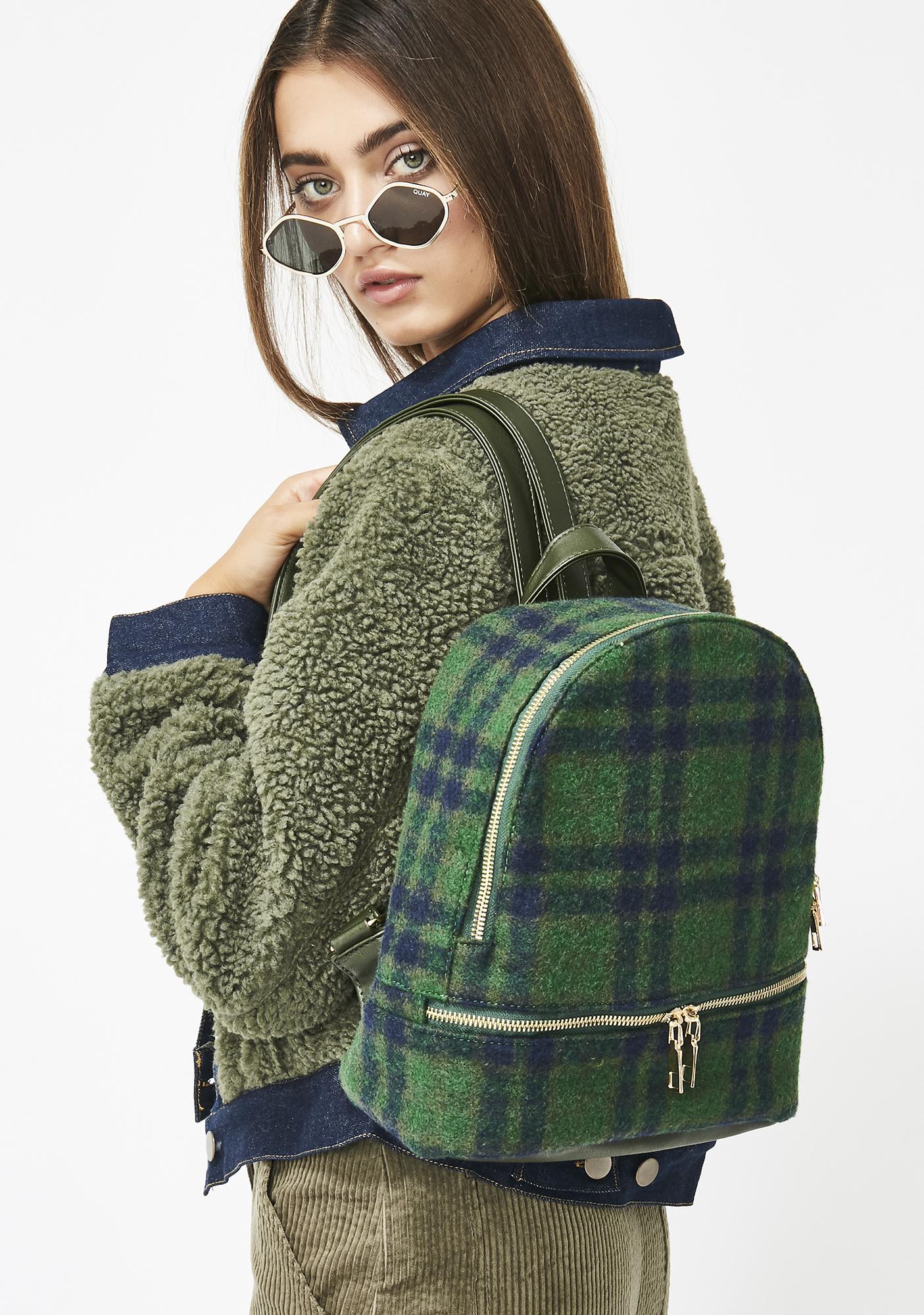 green plaid backpack