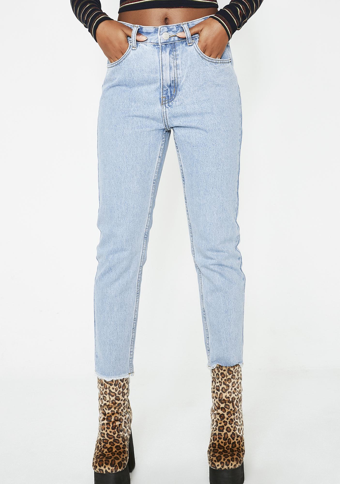 jeans with m on back pocket