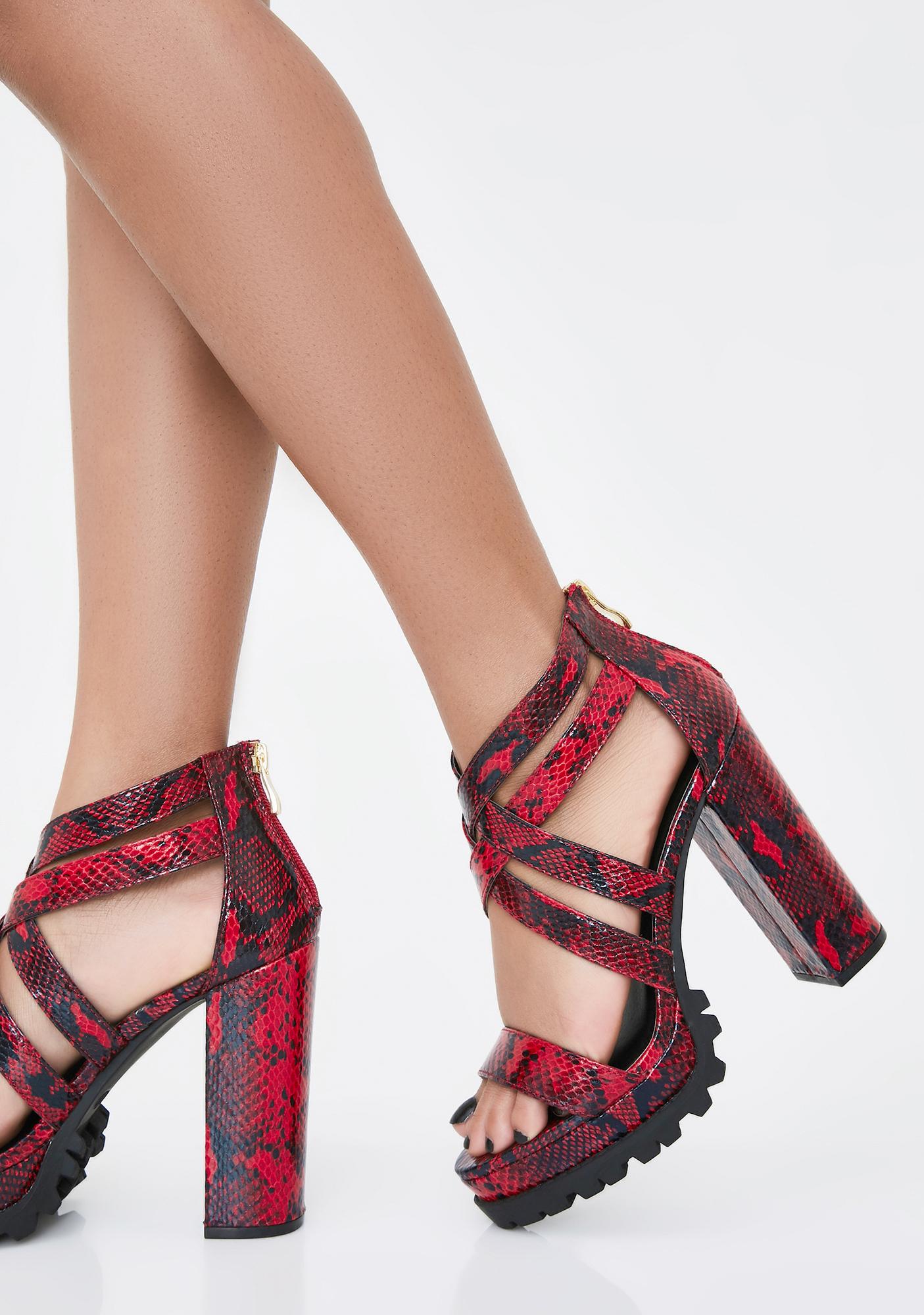 red snakeskin heels