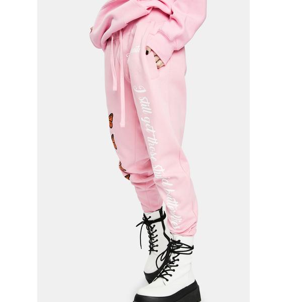 white sweatpants with butterflies