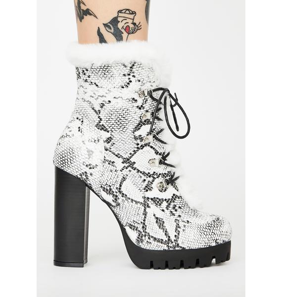 snakeskin tie up boots