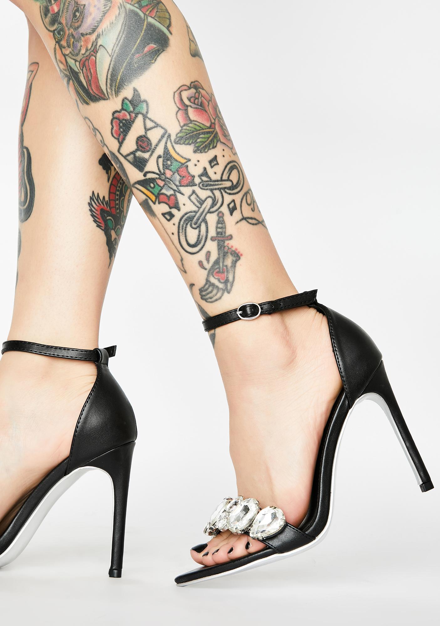 black strappy peep toe heels