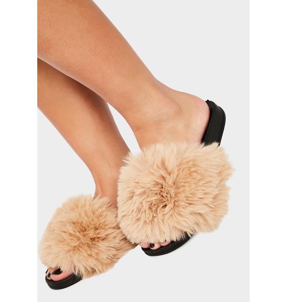 tan fluffy slides