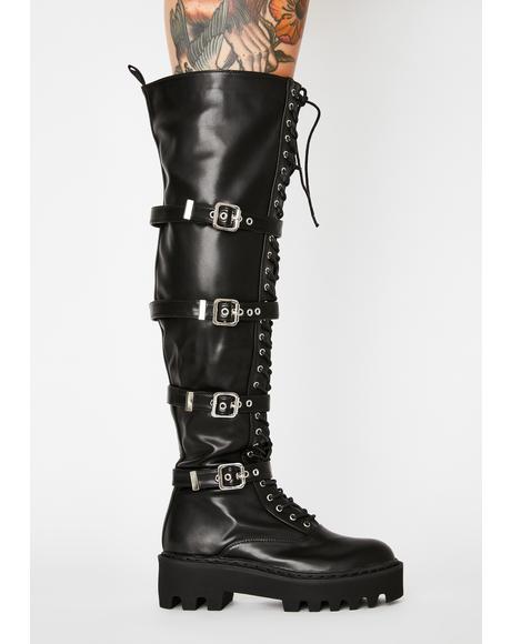 thigh high leather boots with buckles