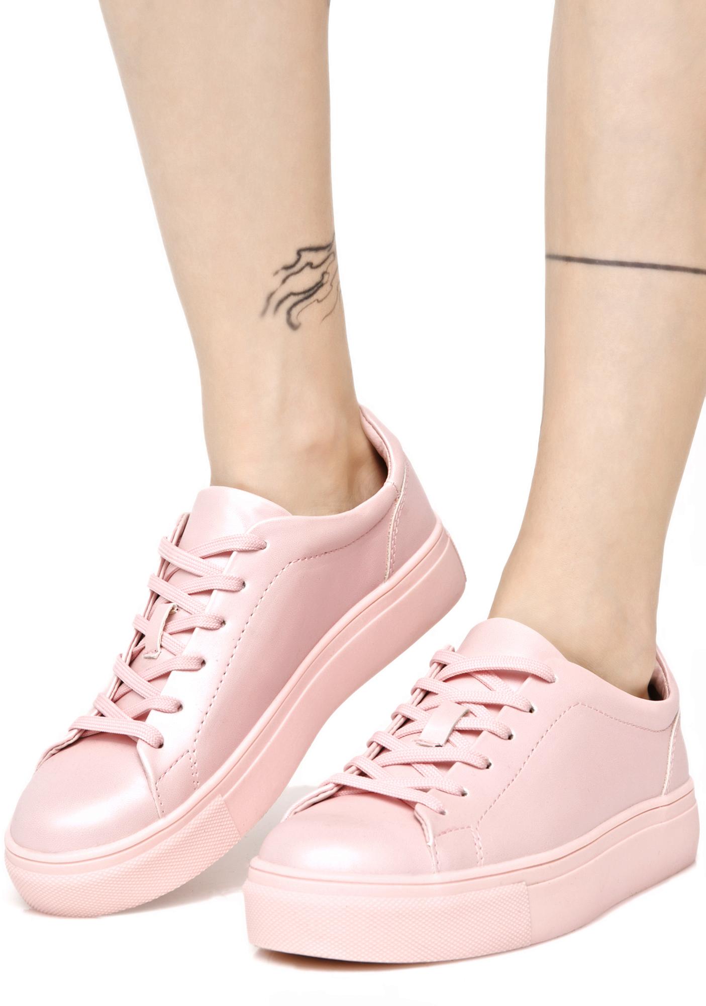 pastel pink tennis shoes