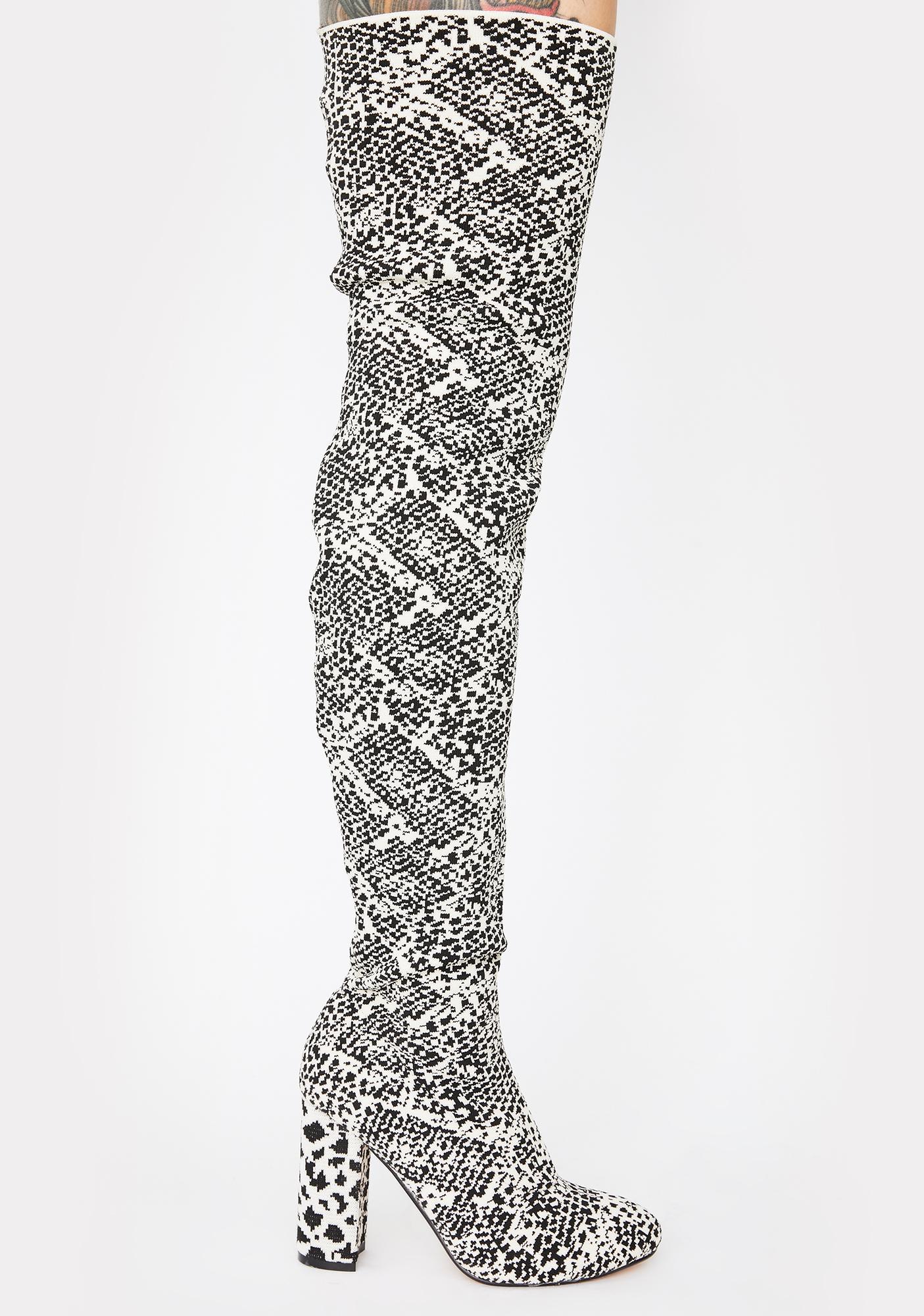 black and white snakeskin thigh high boots