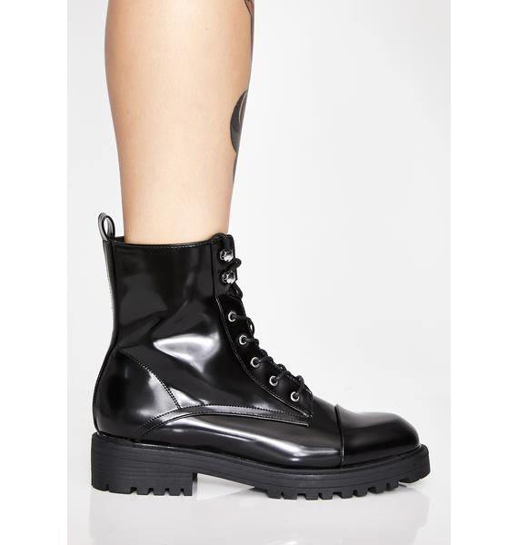 glossy black shoes