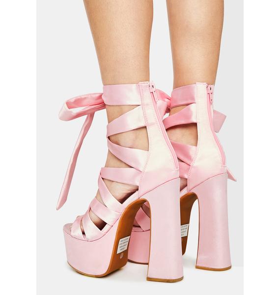 pink platform heels with bow