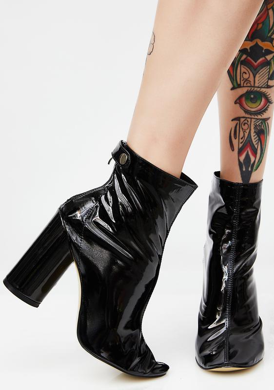 black vinyl boots