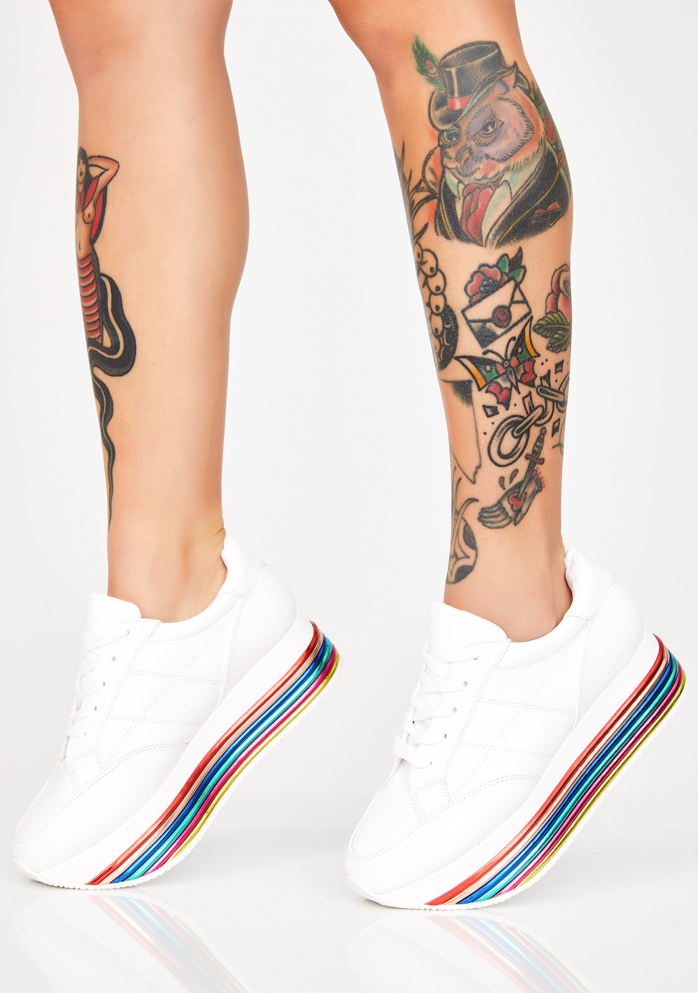 white shoes with rainbow stripe
