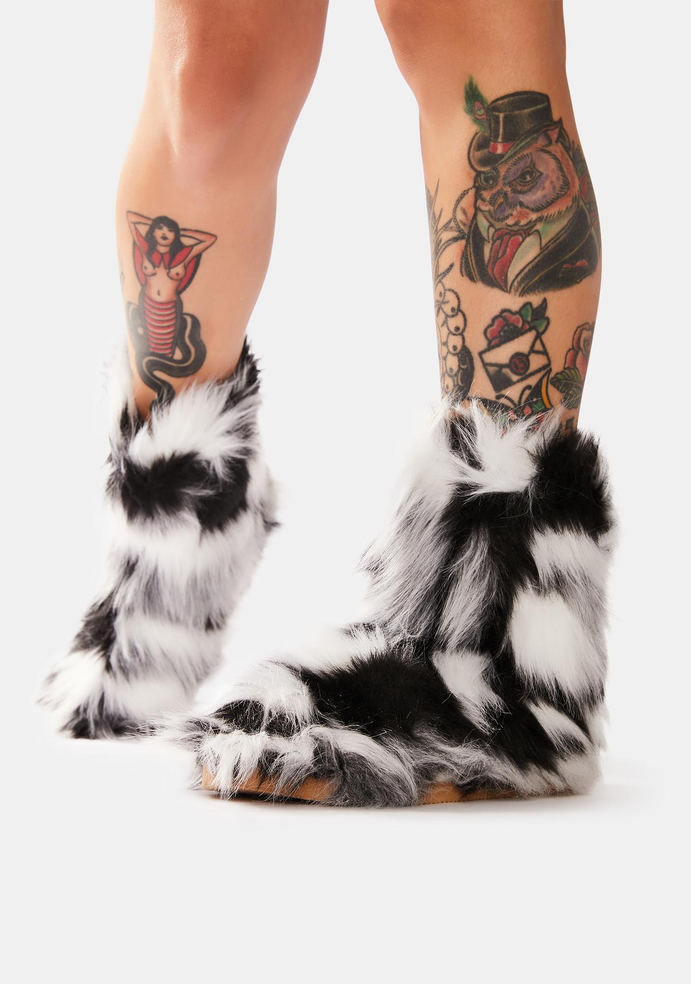 black ankle boots with white fur