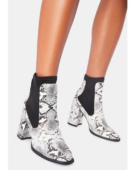 white booties snakeskin heel