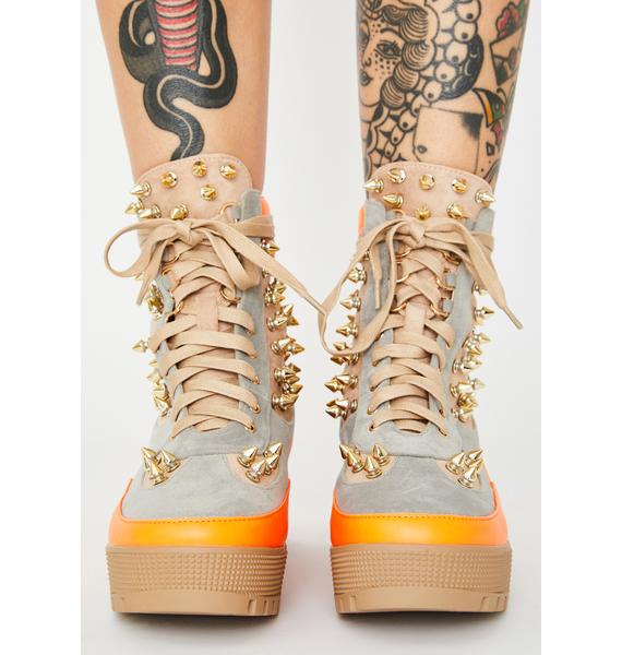 combat boots with gold hardware