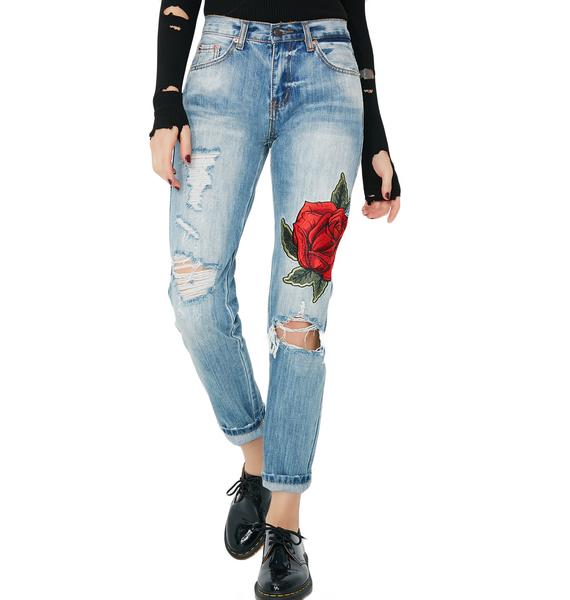 distressed jeans with patches