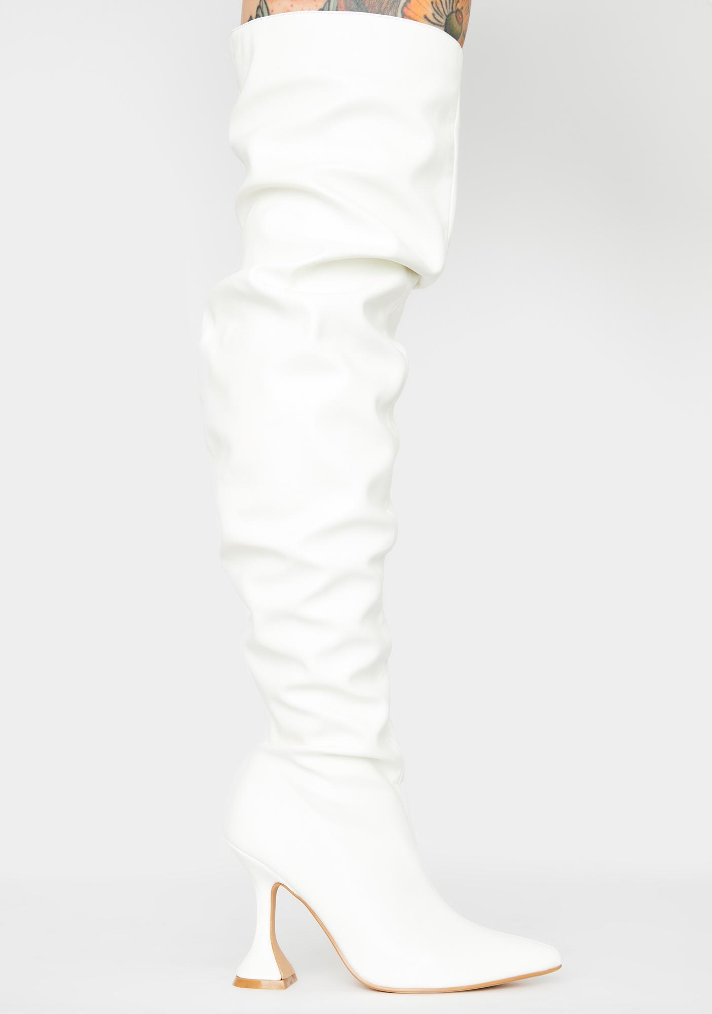 white boots over the knee