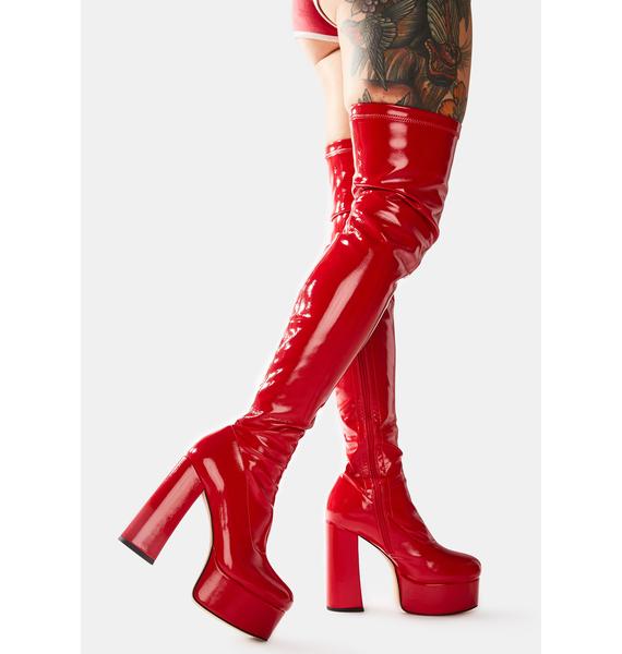 red vinyl thigh high boots