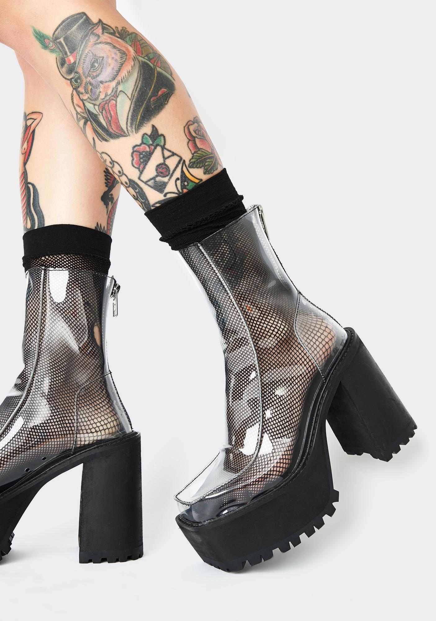 clear black boots