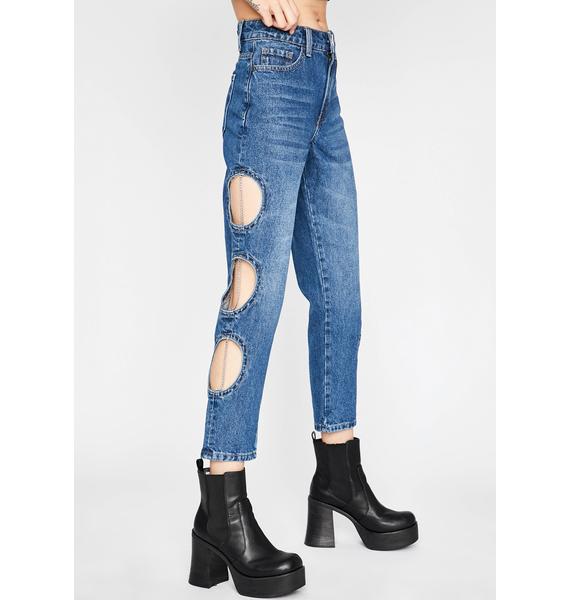cut up jeans with chains