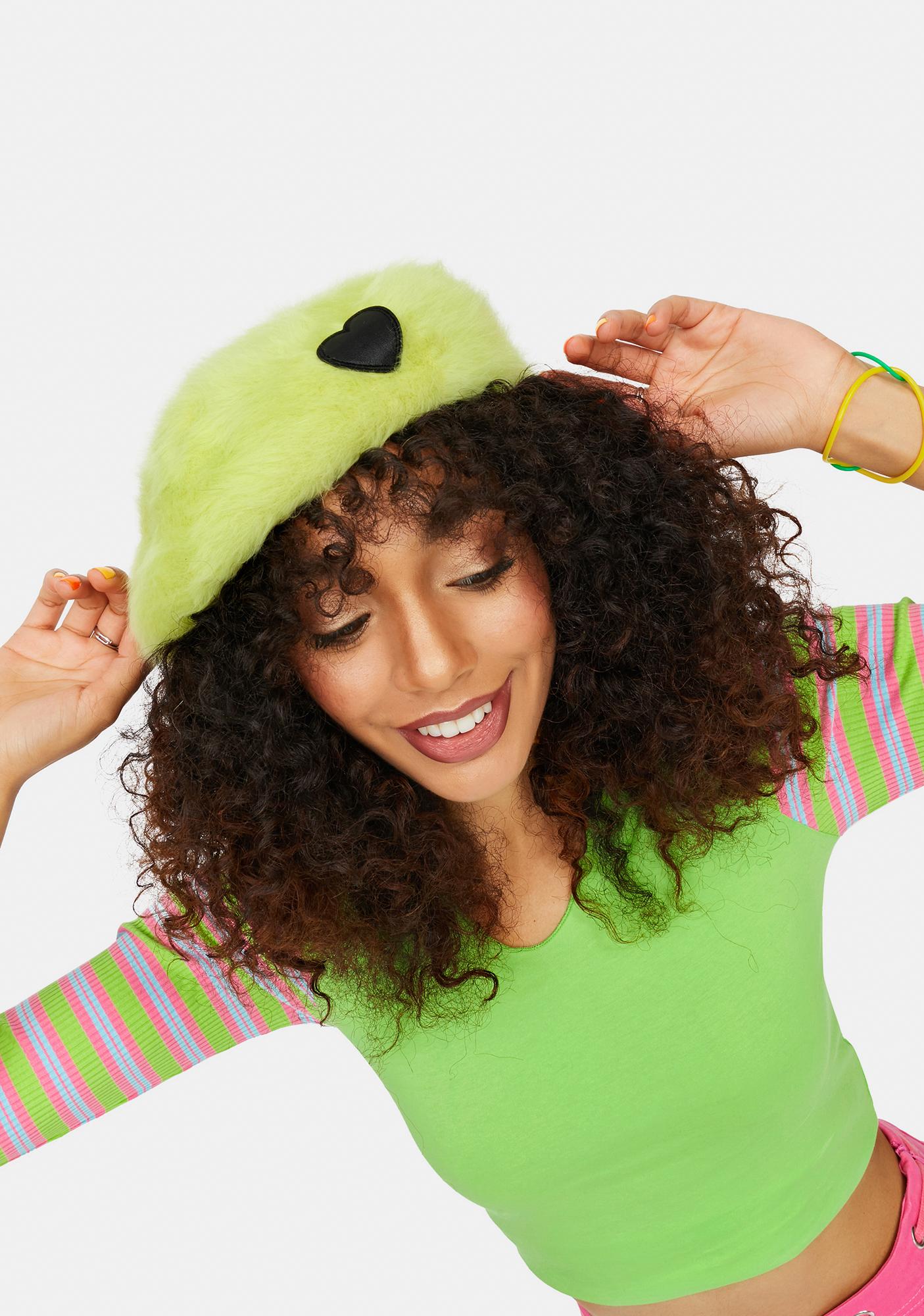 green fuzzy hat