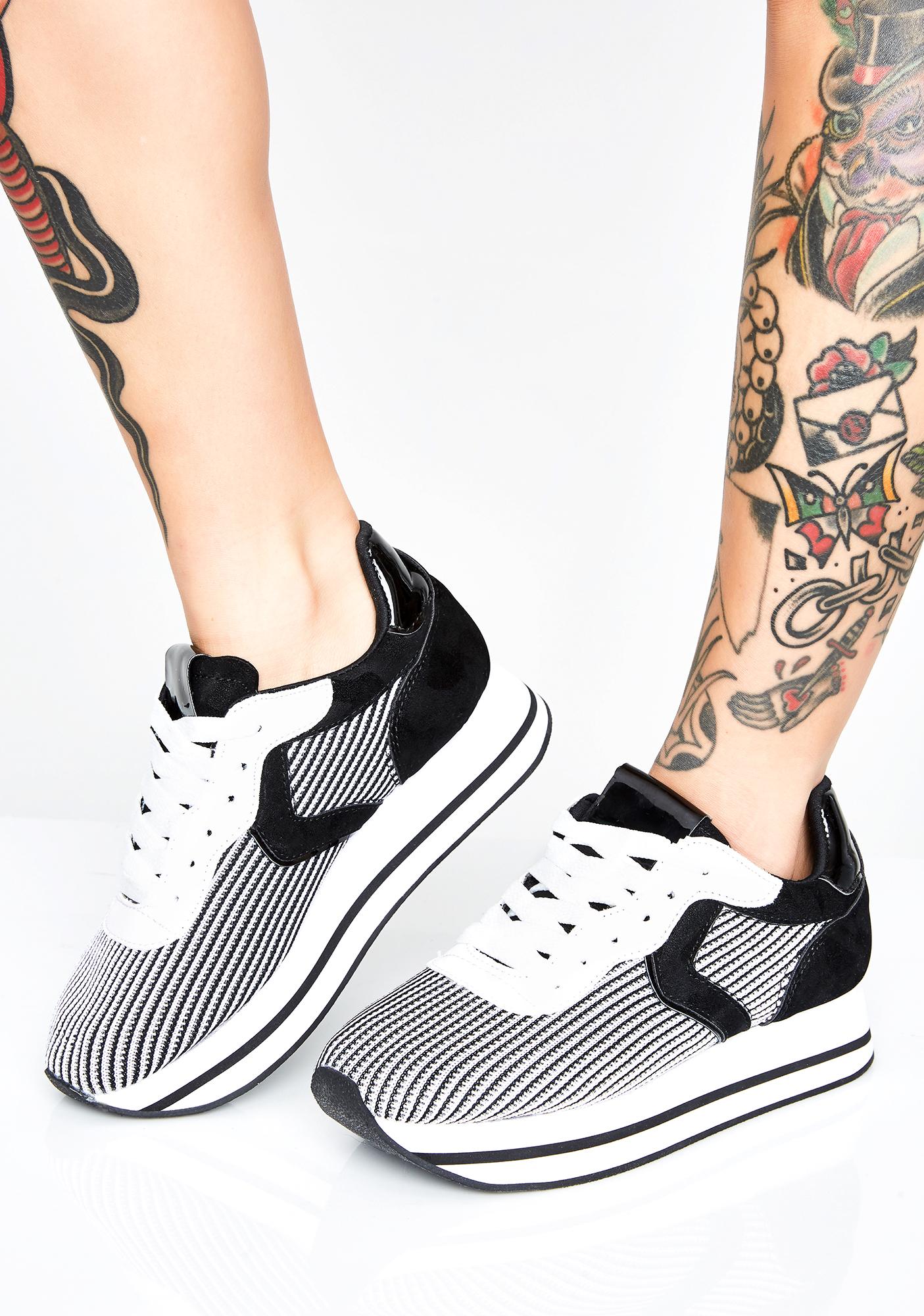 black and white striped platform sneakers