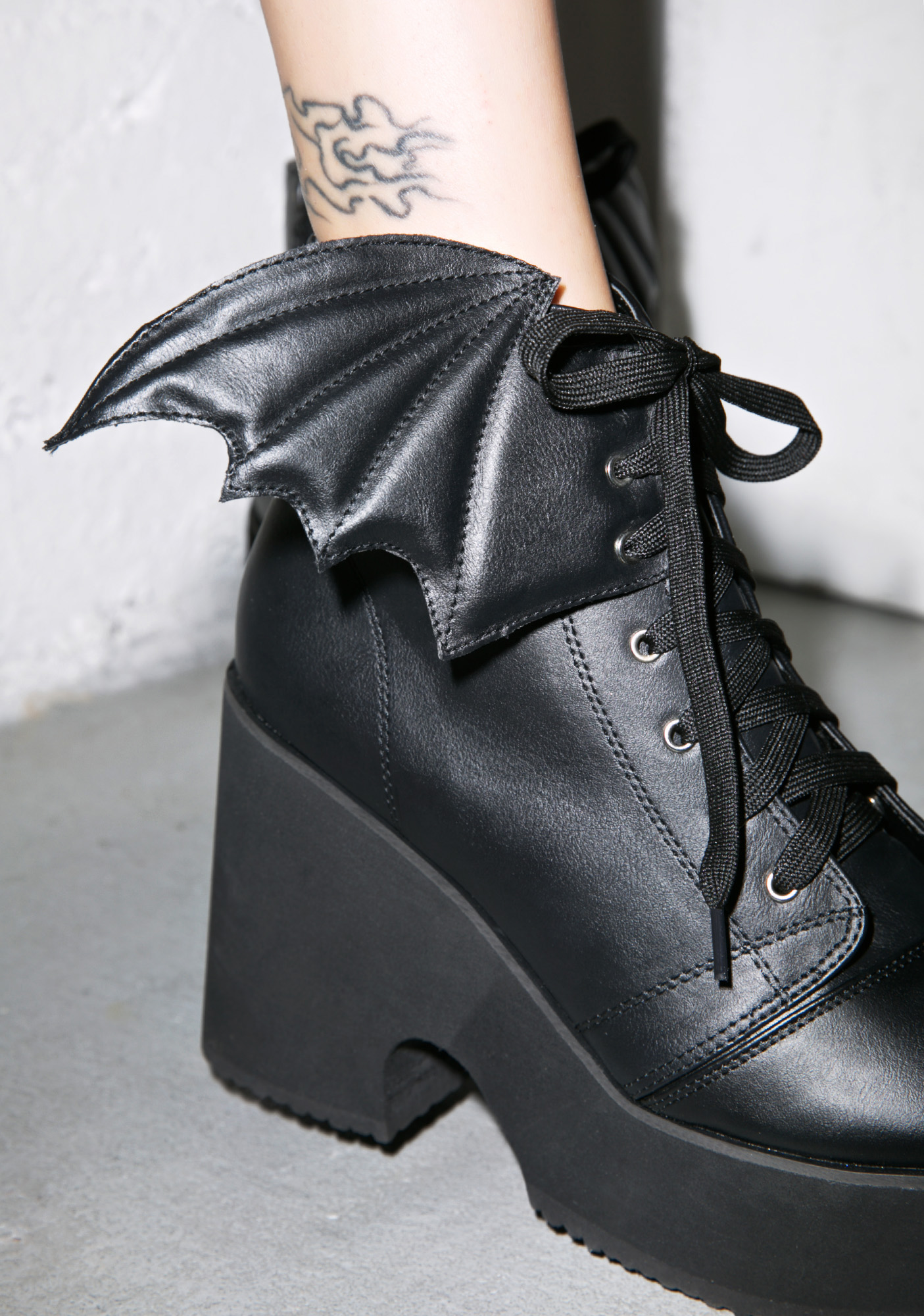 bat wing platform boots