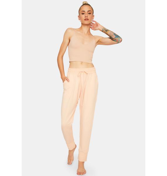 peach colored sweatpants