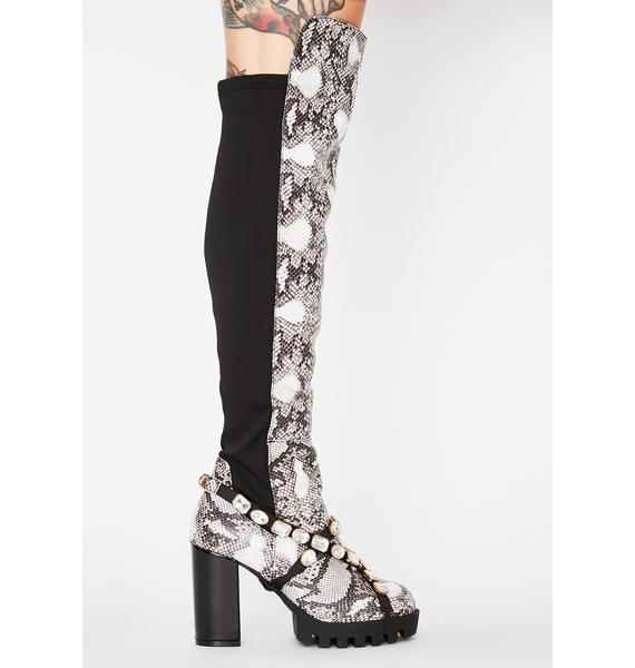 snakeskin thigh high boots