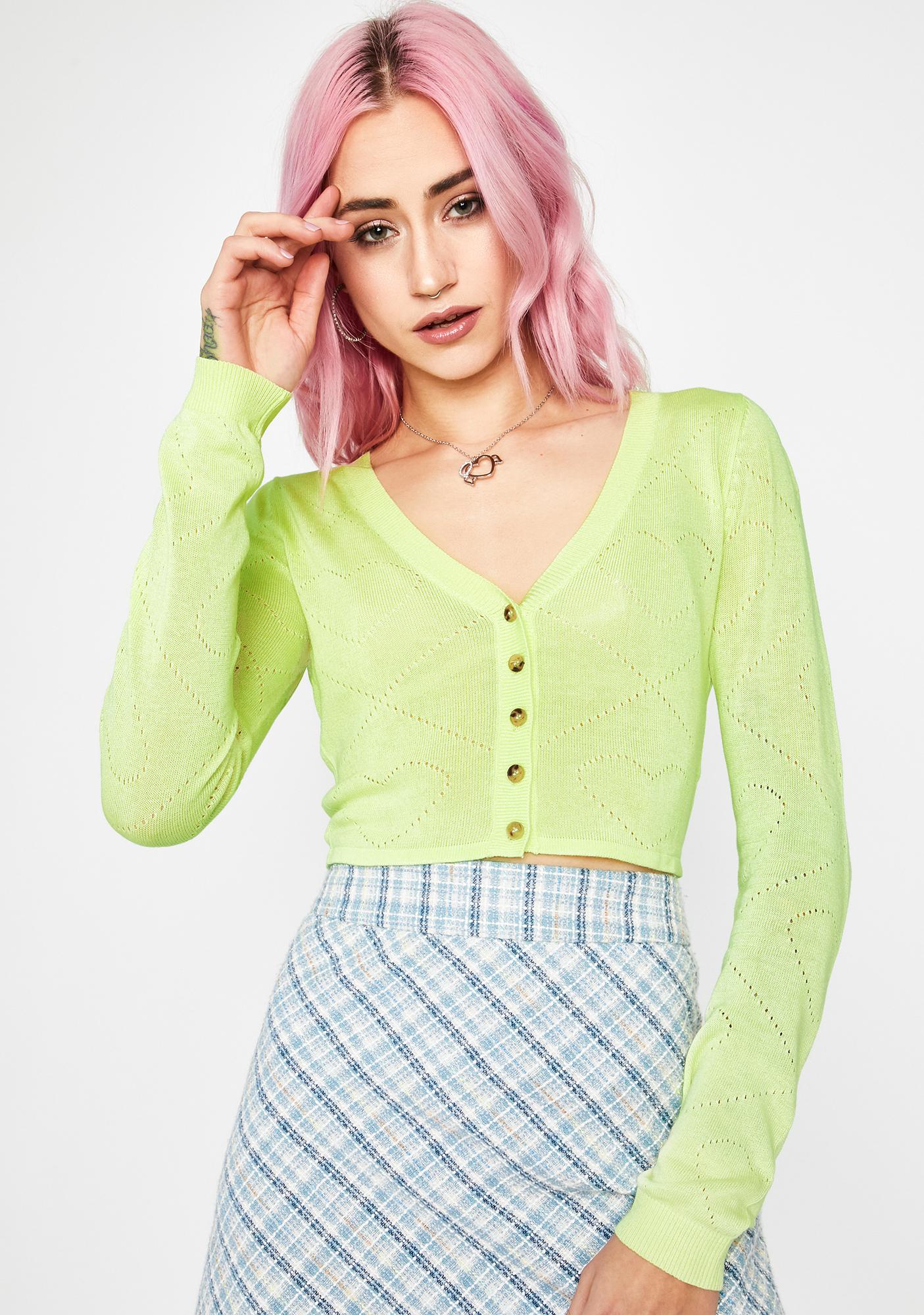 green cardigan cropped