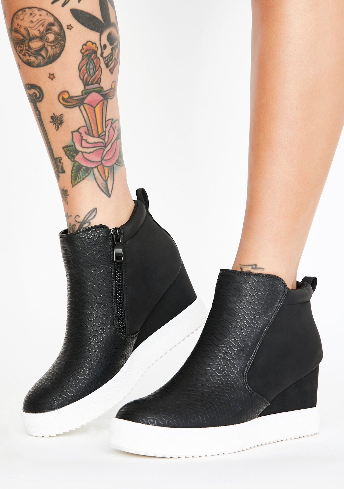 snakeskin wedge booties