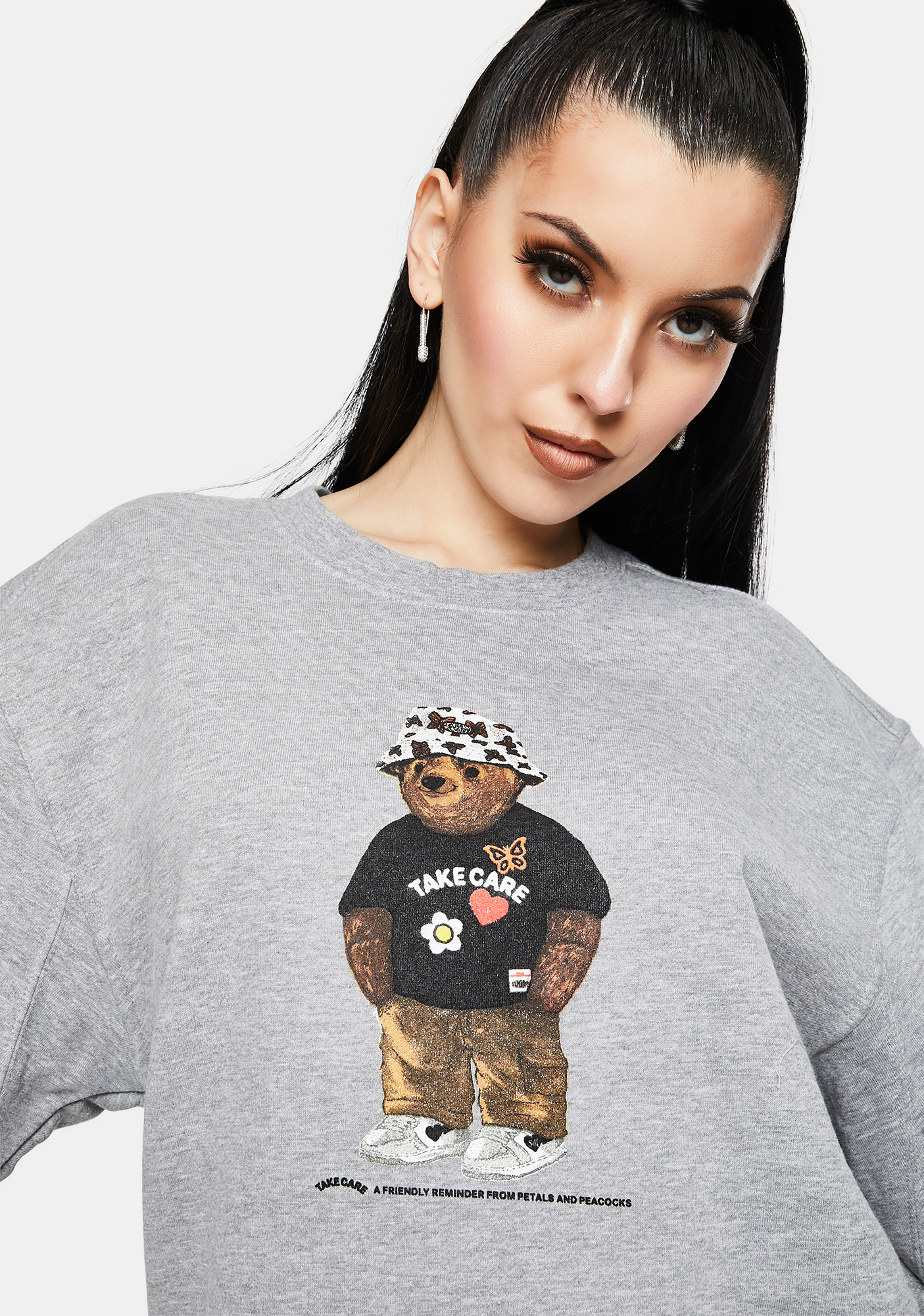 Petals and Peacocks Take Care Bear Graphic Sweatshirt | Dolls Kill