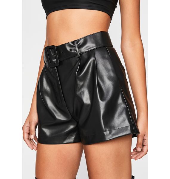 black leather shorts paper bag