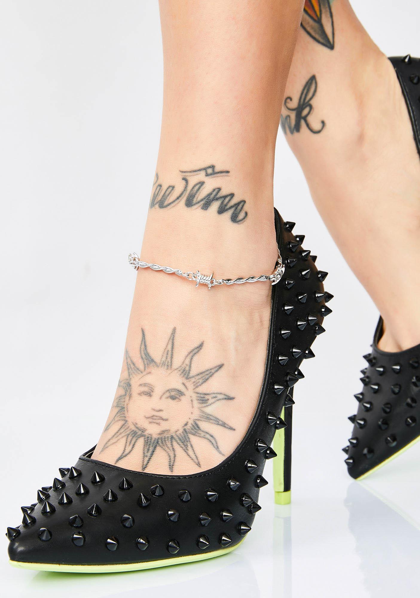 Barbed Wire Tattoo on Ankle: Bold & Edgy