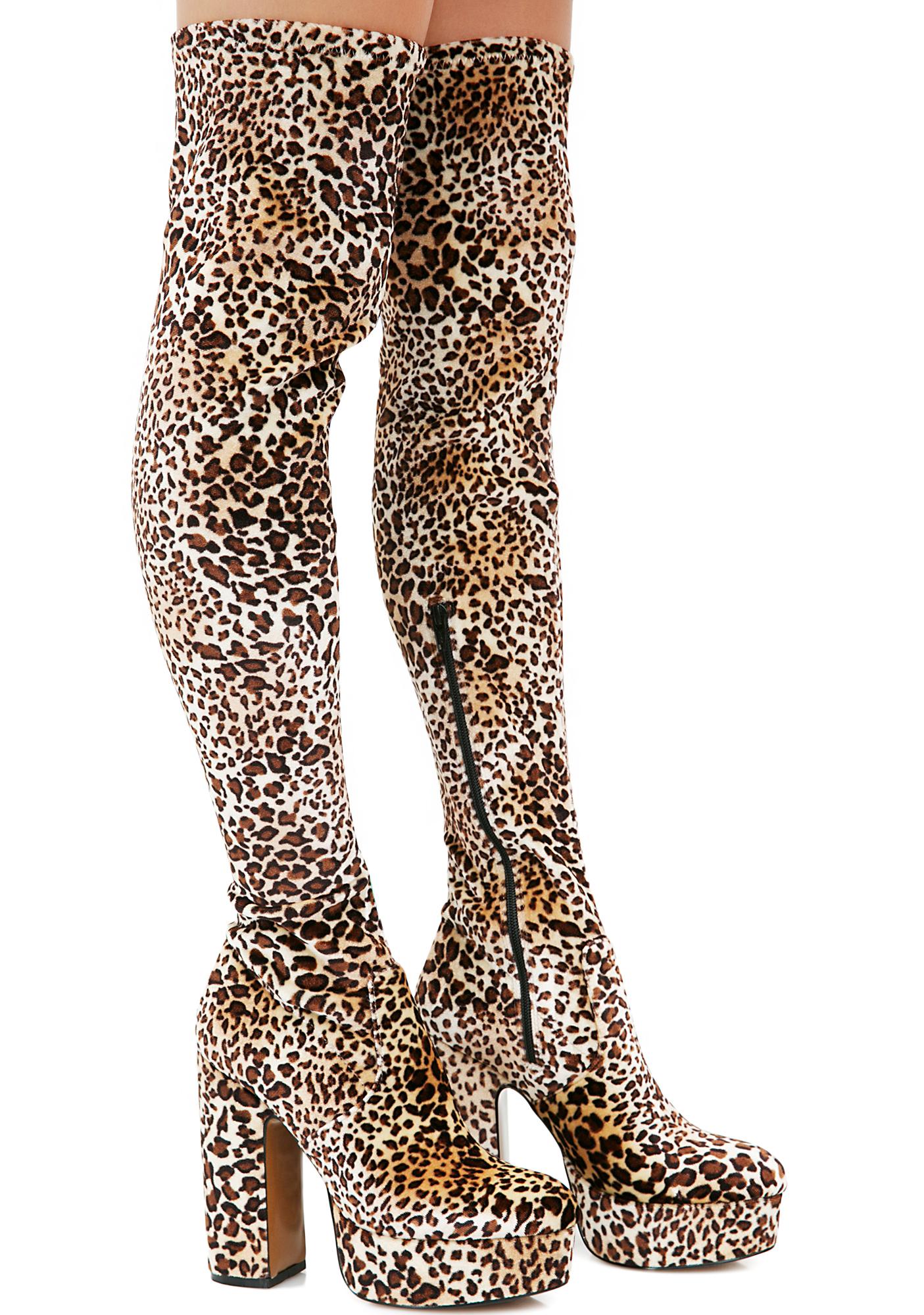 knee high cheetah boots