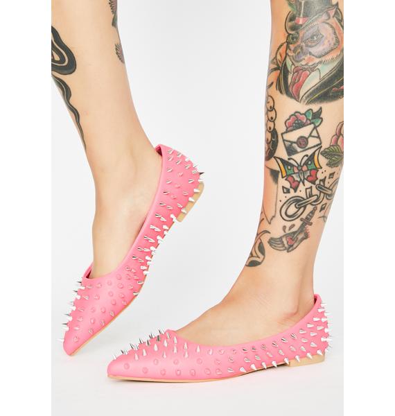 spike studded flats