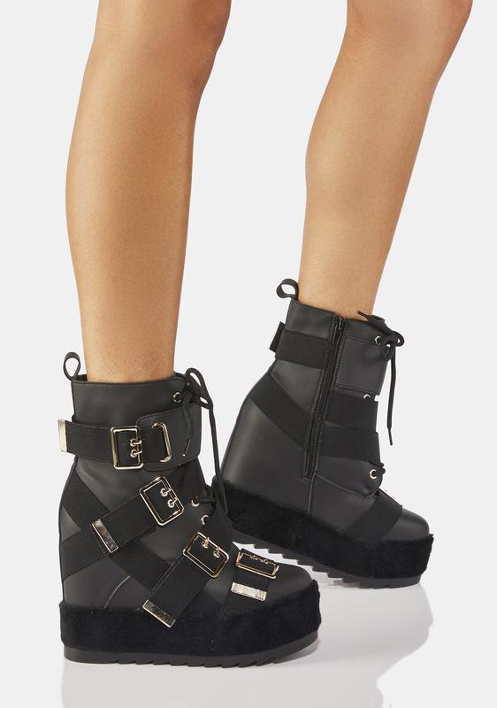 buckle wedge boots