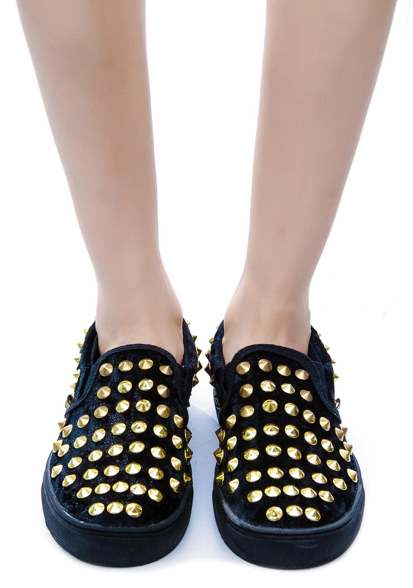 spiked flats