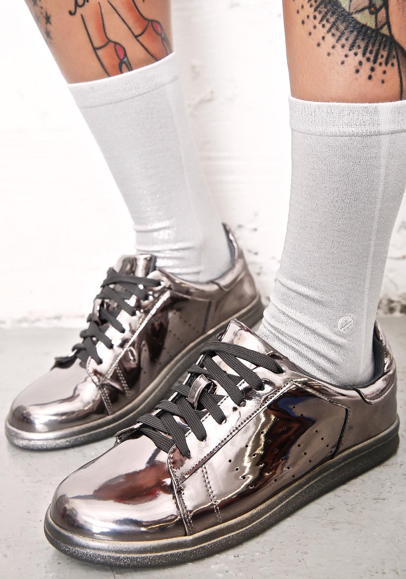 shiny silver sneakers