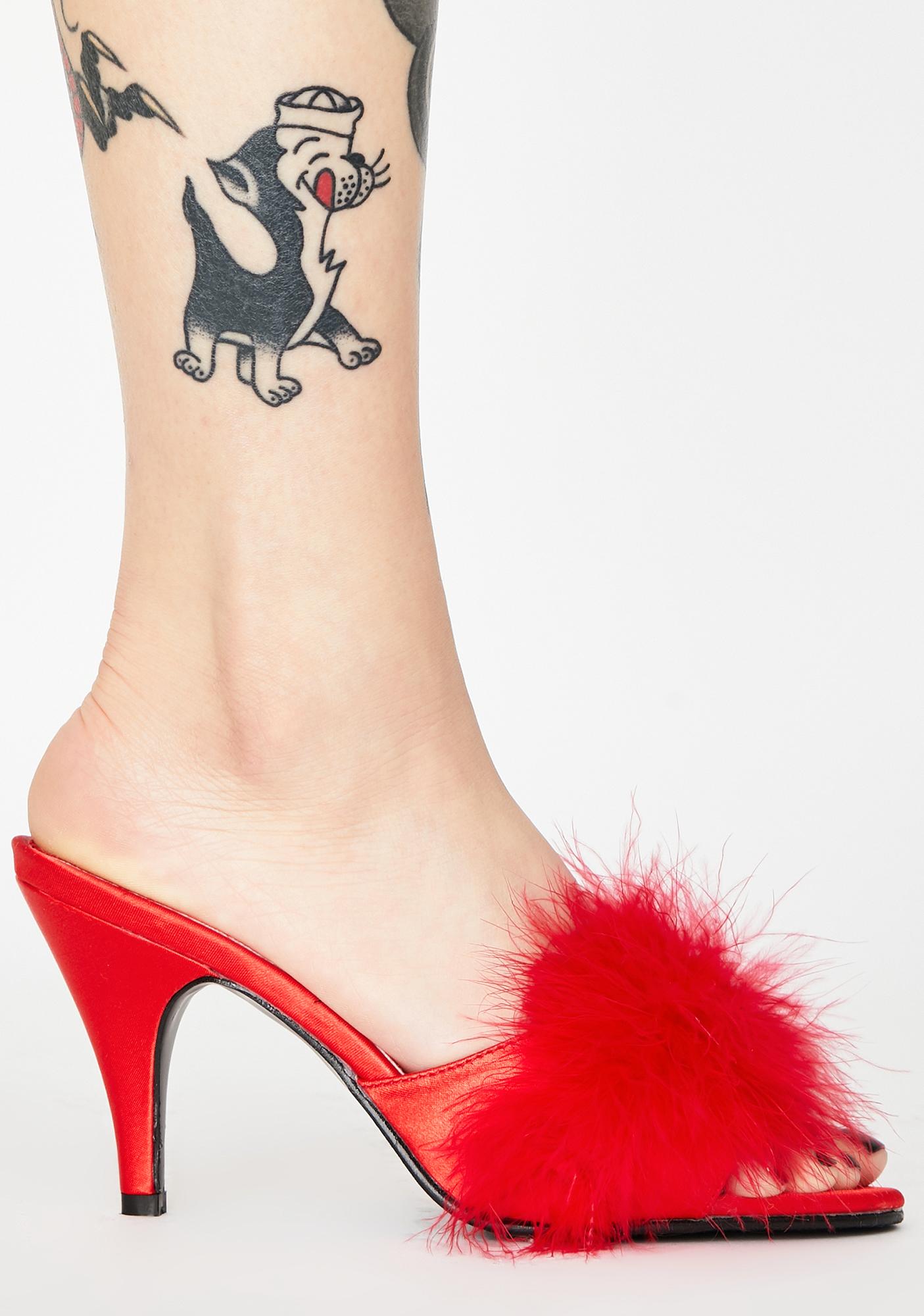 red fluffy heels