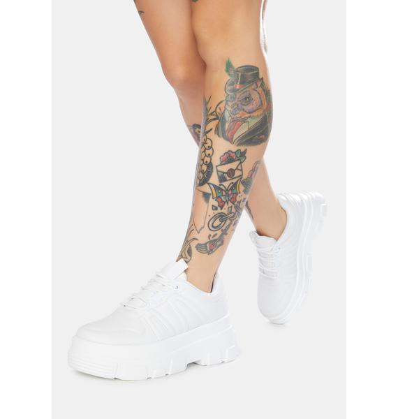 white faux leather platform sneakers