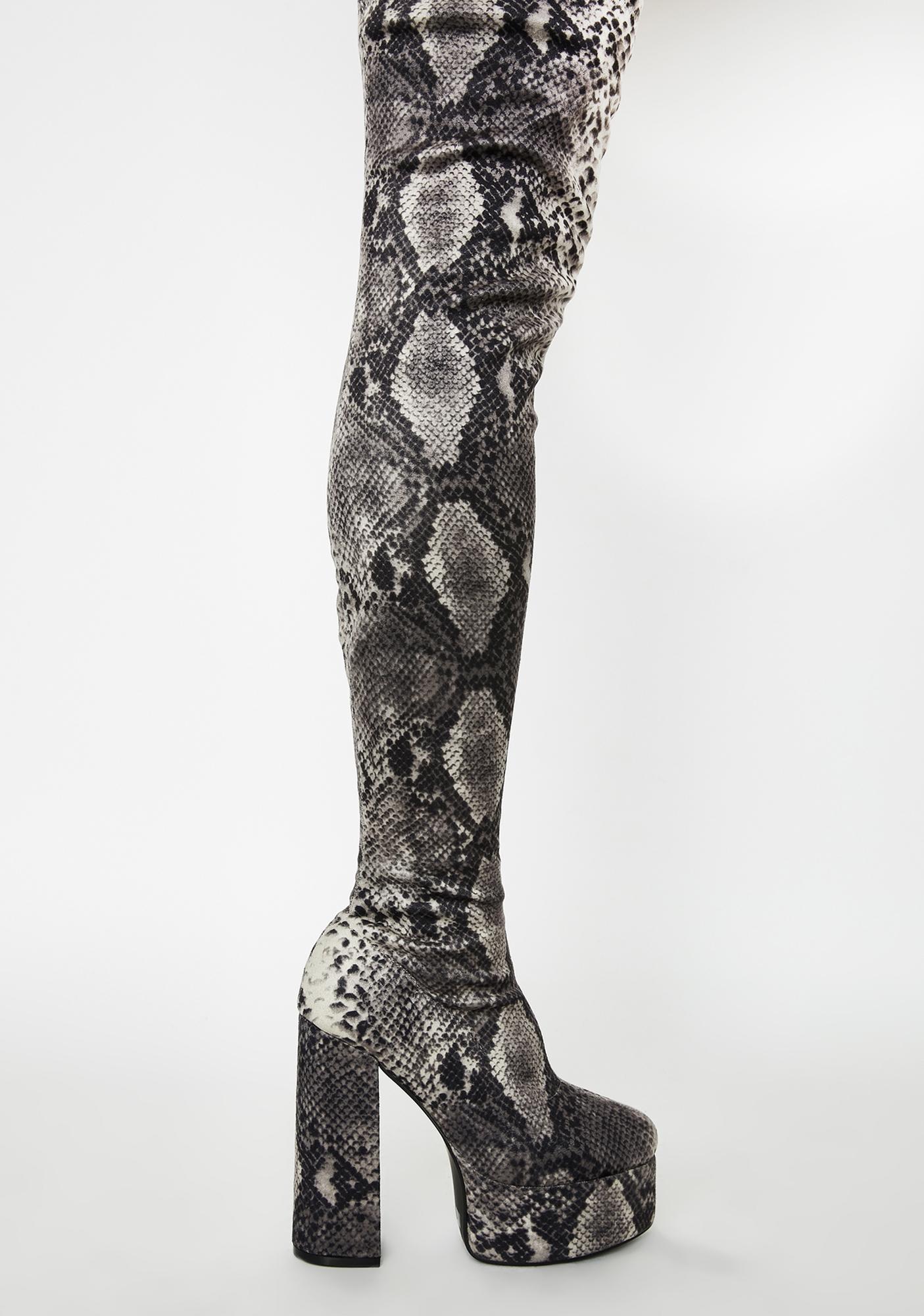 white booties snakeskin heel