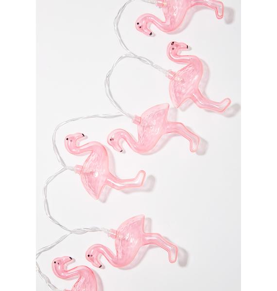 shiny blue flamingo string toy