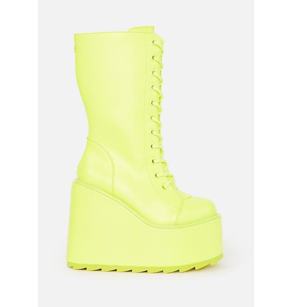 neon yellow knee high boots