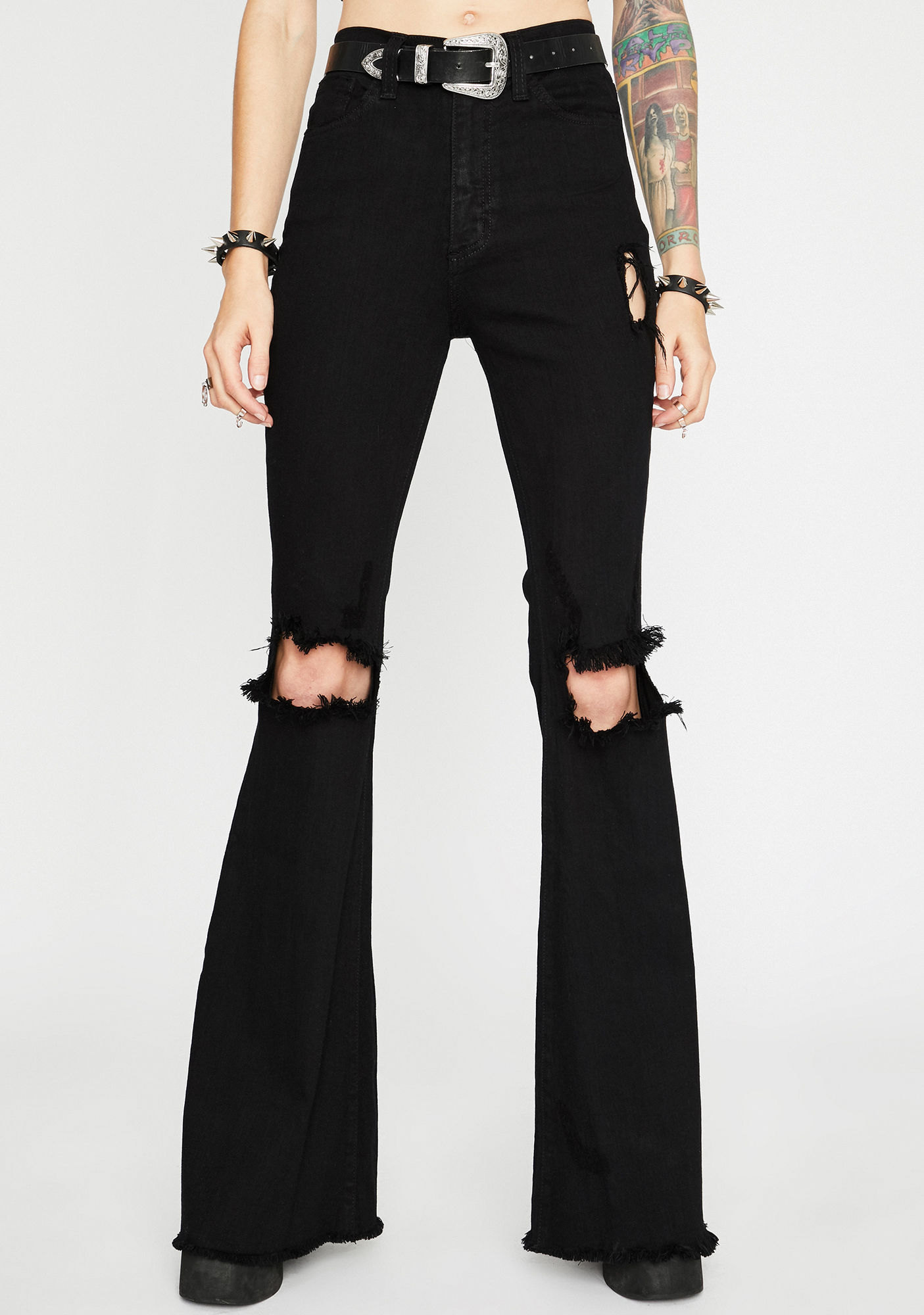 flared ripped knee jeans