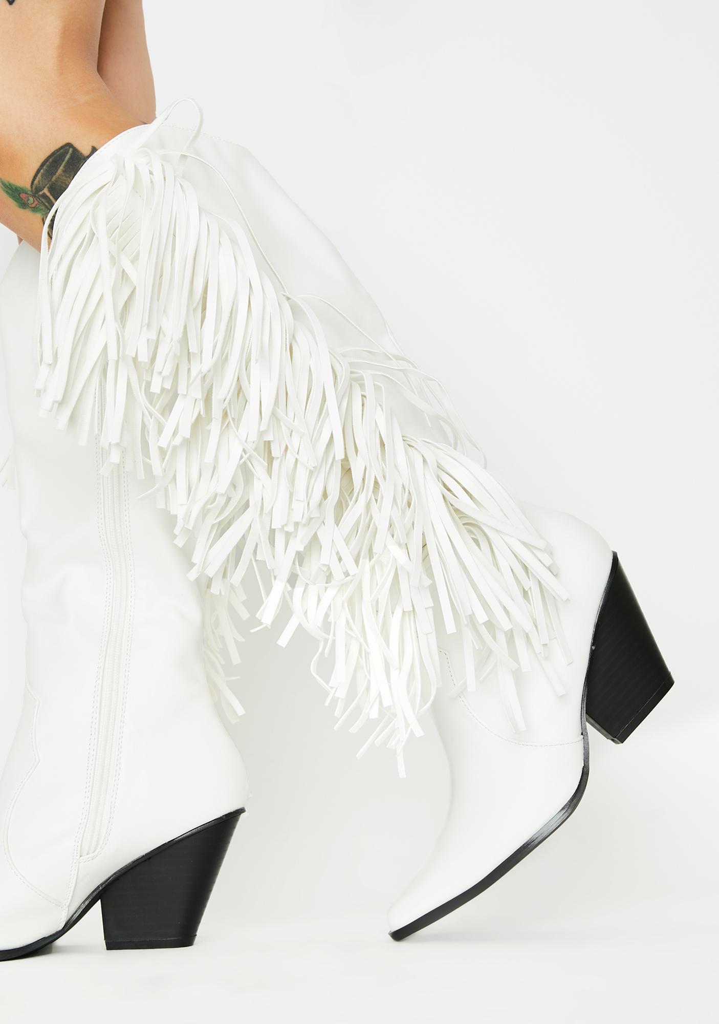 white cowgirl boots with fringe
