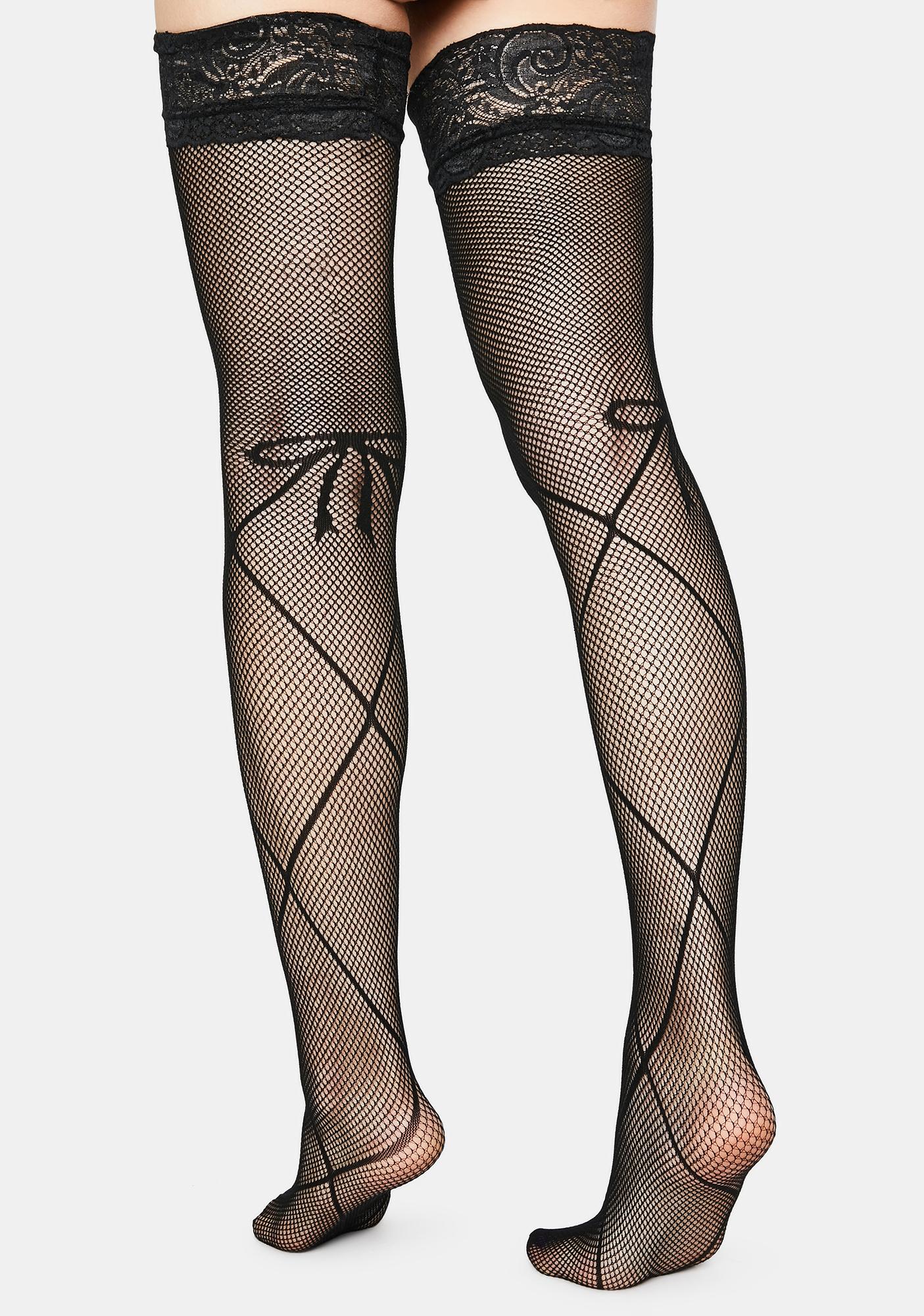 white fishnet socks with bow