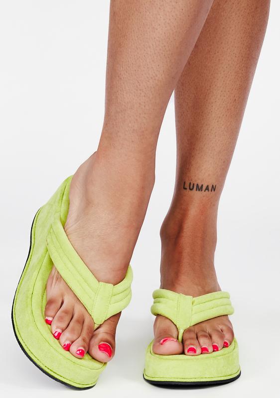 green platform flip flops